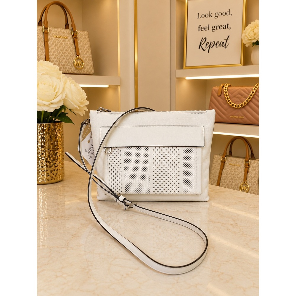 C219 Coach perforated crossbody swingback